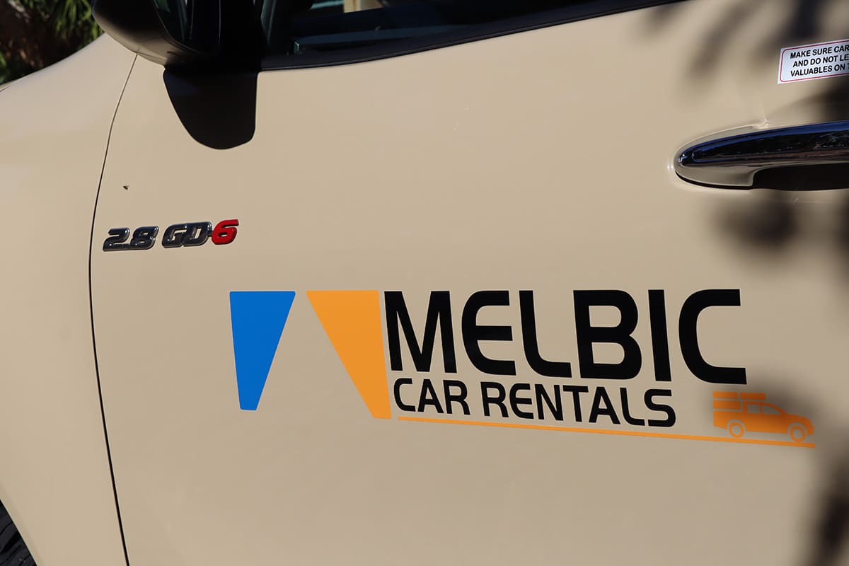 Melbic 4x4 Car Rentals Namibia logo on vehicle