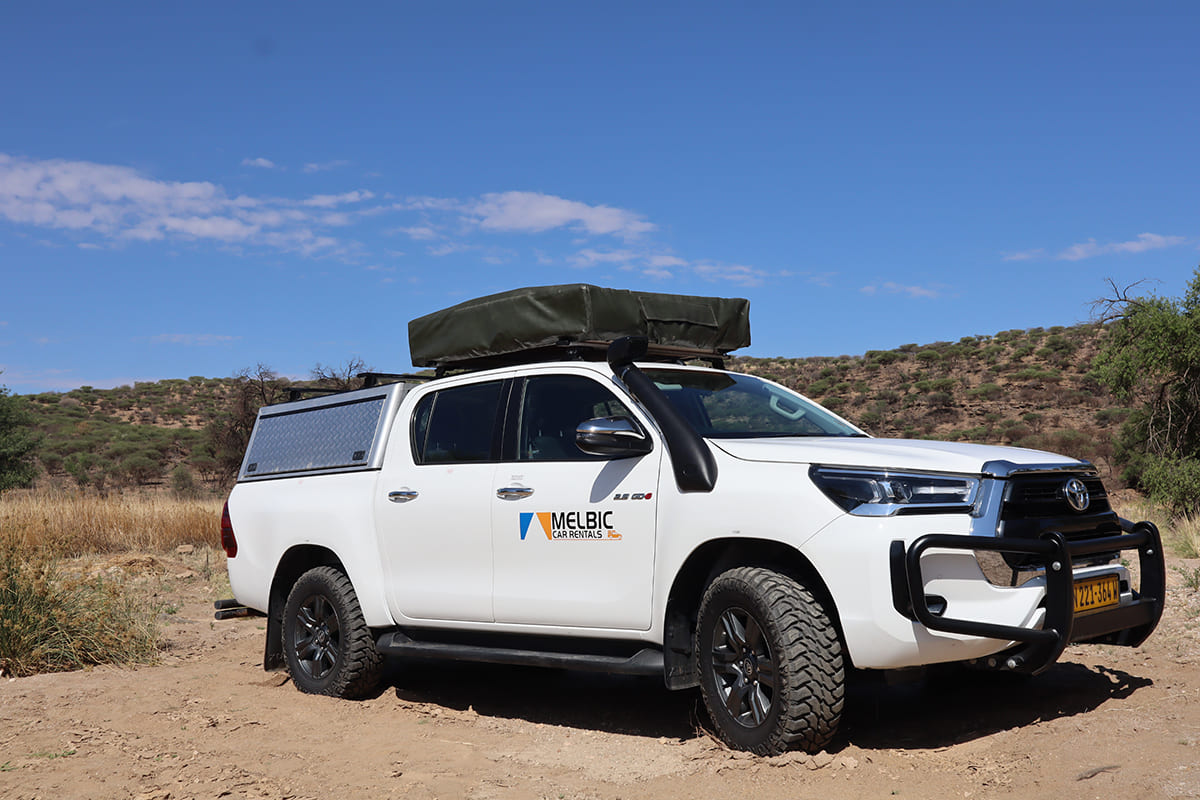 Melbic 4x4 Car Rentals Namibia Toyota Hilux DC 2.8 With Tent - Closed