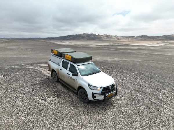 Dirty Melbic 4×4 Car Rental vehicle in Namibia Dirty Melbic 4x4 Car Rental vehicle in Namibia